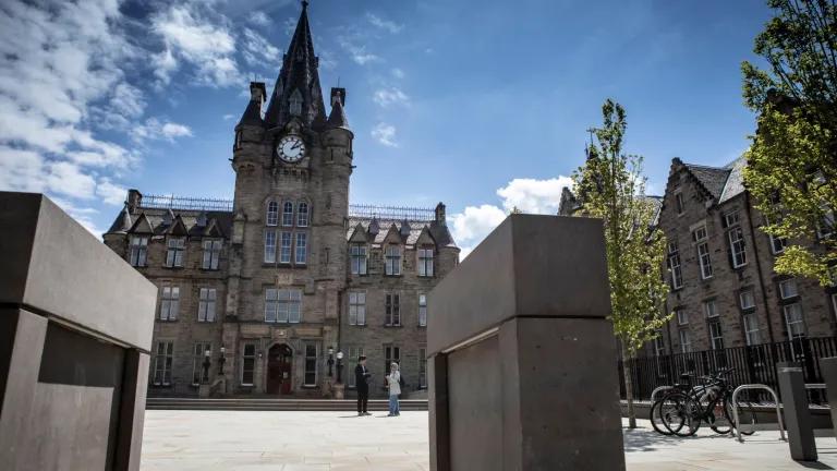 The main entrance of the Edinburgh Futures Institute on a sunny day.